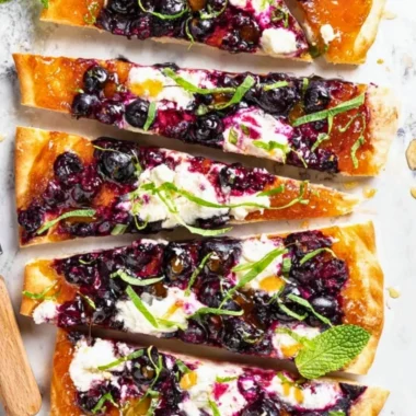Freshly baked Blueberry Flatbread topped with juicy blueberries