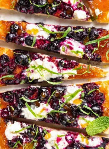 Freshly baked Blueberry Flatbread topped with juicy blueberries
