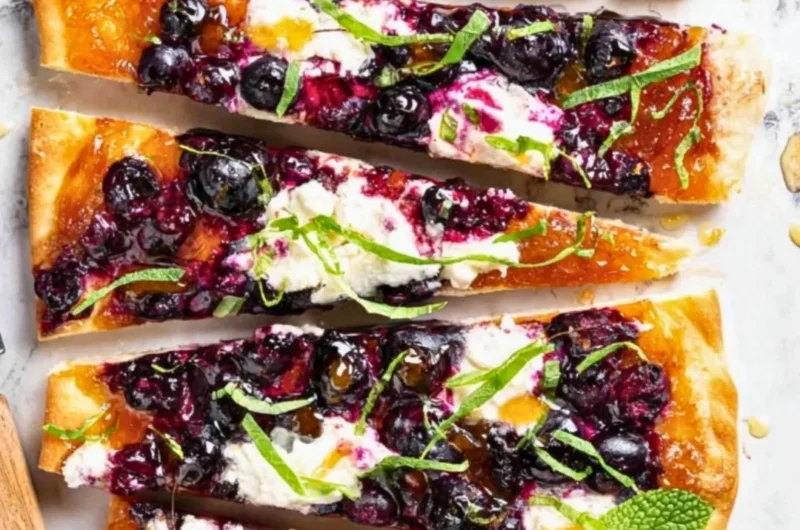 Freshly baked Blueberry Flatbread topped with juicy blueberries