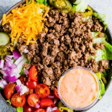 Healthy burger bowls with fresh vegetables and lean protein in a bowl