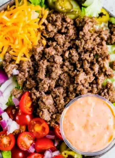 Healthy burger bowls with fresh vegetables and lean protein in a bowl