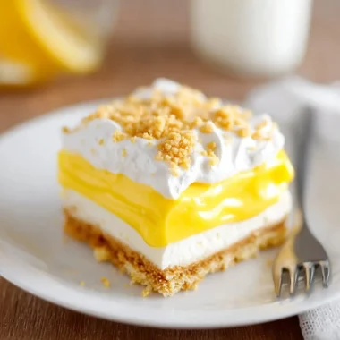 Heavenly Oreo lemon dessert with creamy filling and Oreo crust