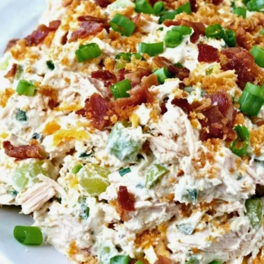 Keto Jalapeno Popper Chicken Salad in a bowl with fresh toppings