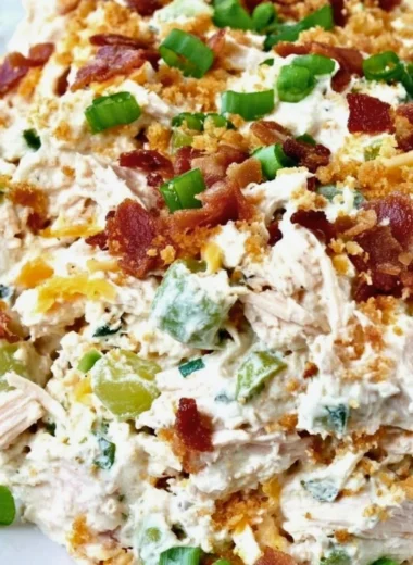 Keto Jalapeno Popper Chicken Salad in a bowl with fresh toppings