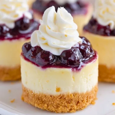 Healthy mini lemon blueberry cheesecakes served on a platter