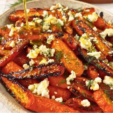Honey garlic roasted carrots topped with crumbled feta cheese