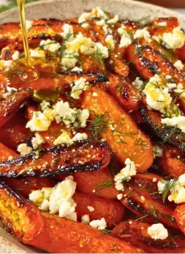 Honey garlic roasted carrots topped with crumbled feta cheese