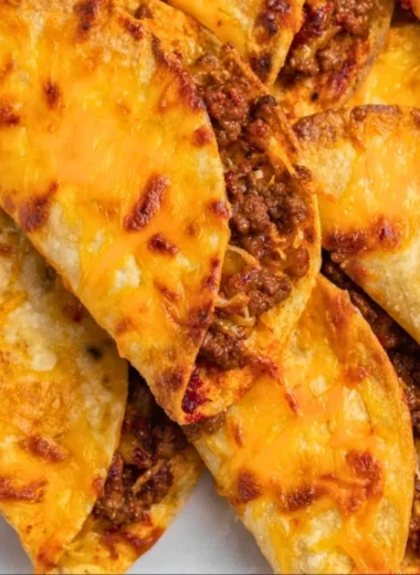 Delicious sheet pan tacos ready to be served, with fresh toppings and ingredients.