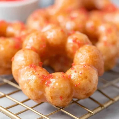Delicious sweet gluten-free mochi donuts on a dessert platter.