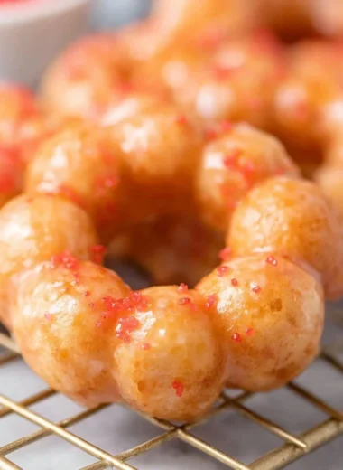 Delicious sweet gluten-free mochi donuts on a dessert platter.