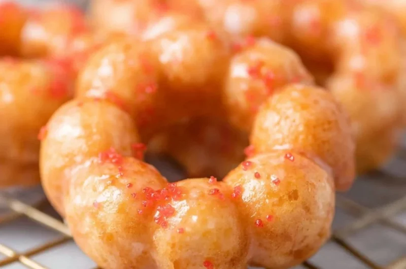 Delicious sweet gluten-free mochi donuts on a dessert platter.