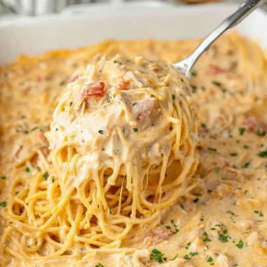 Delicious cheesy casserole topped with melted cheese and herbs