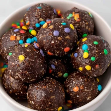 Healthy gluten-free Cosmic Brownie Bites topped with colorful sprinkles