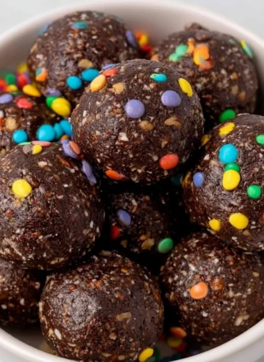 Healthy gluten-free Cosmic Brownie Bites topped with colorful sprinkles