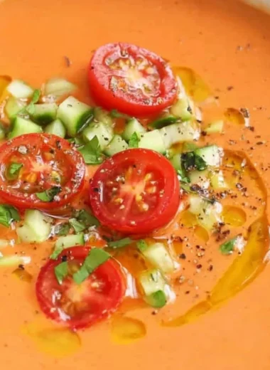Bowl of easy gazpacho made with fresh vegetables and herbs