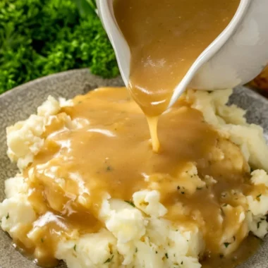 Rich and flavorful homemade gravy made from scratch in a saucepan.