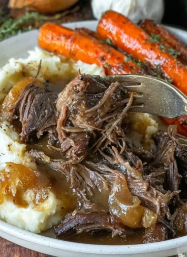 Slow Cooker Classic Pot Roast served with vegetables on a rustic table