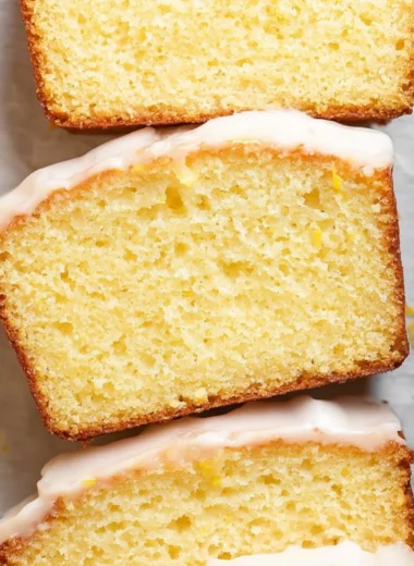 Homemade Starbucks Copycat Lemon Loaf with glaze on a cooling rack