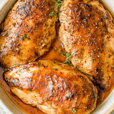 Brown Sugar Garlic Chicken Breasts garnished and served on a plate