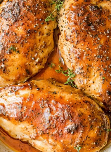 Brown Sugar Garlic Chicken Breasts garnished and served on a plate