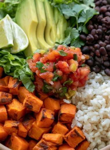 Cozy black bean sweet potato burrito bowl filled with fresh ingredients