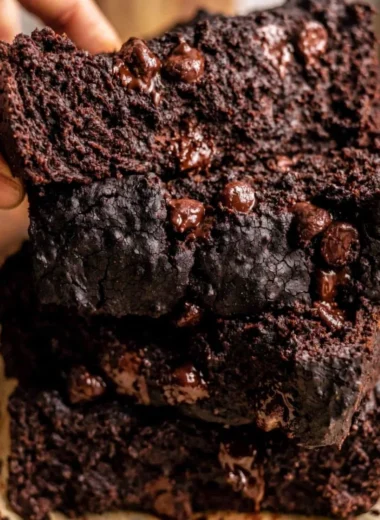 Cozy Chocolate Pumpkin Bread fresh out of the oven with a rich chocolate glaze.