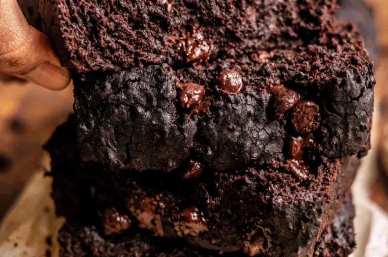 Cozy Chocolate Pumpkin Bread fresh out of the oven with a rich chocolate glaze.