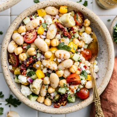 Delicious cozy dense bean salad showcasing vibrant beans and fresh ingredients.