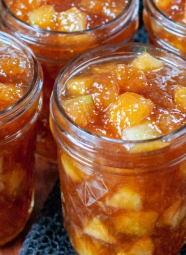 Homemade apple preserving jars and ingredients for fall recipes.