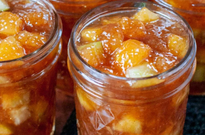 Homemade apple preserving jars and ingredients for fall recipes.