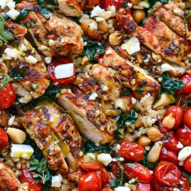Delicious Greek Chicken served with flavorful Lemon Rice on a plate.