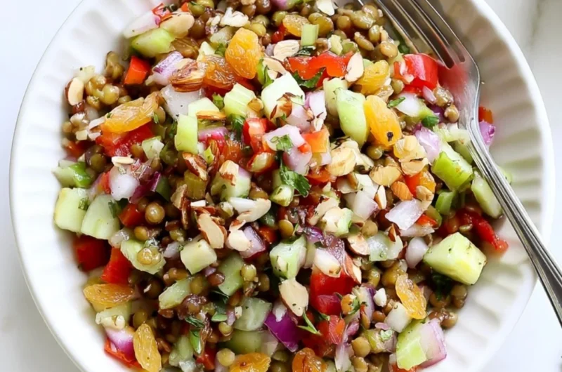 Colorful and fresh lentil salad with vegetables and dressing